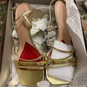 Gucci Gold Metallic Strappy Heeled Sandals with Red Insole Accent